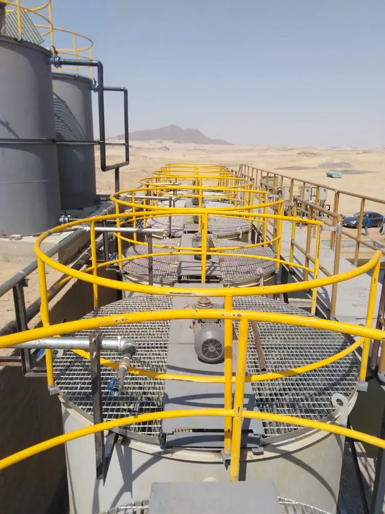 Walkways and handrails along a tank line