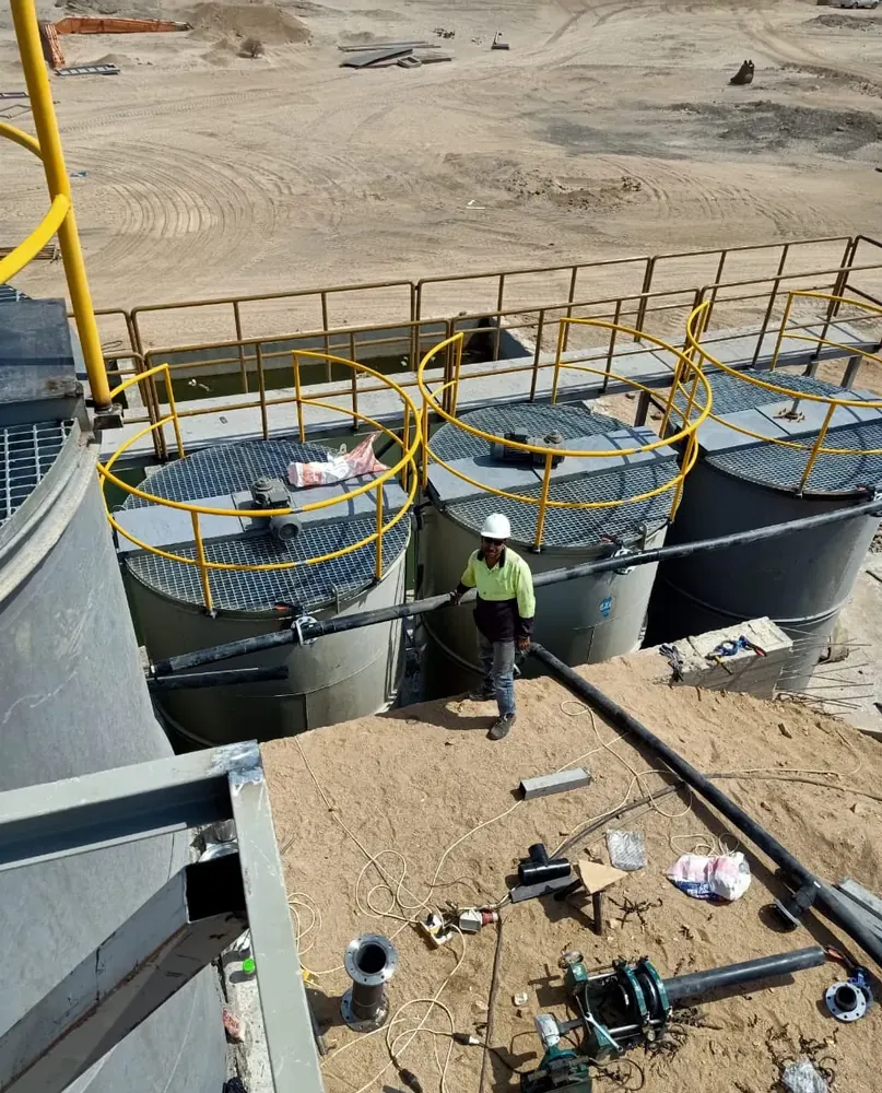 Piping and handrails on process tanks